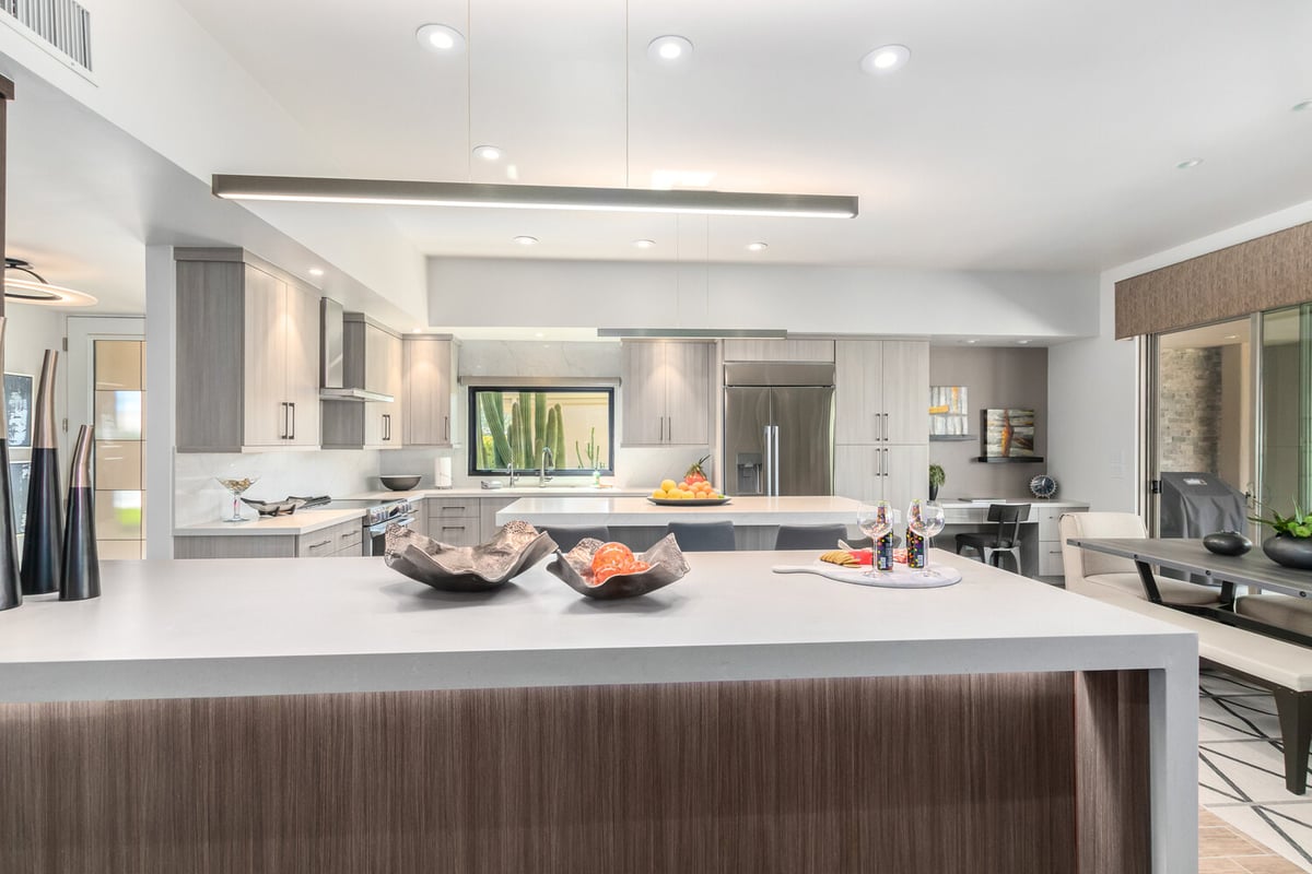 Custom kitchen design with full view of dining area by Kitchens by Good Guys in Fountain Hills, AZ.