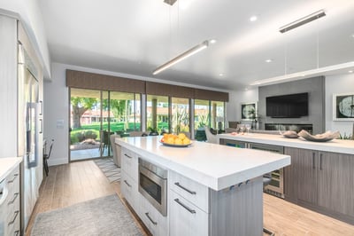 Open concept kitchen and living space with outdoor views by Kitchens by Good Guys in Mesa, AZ.