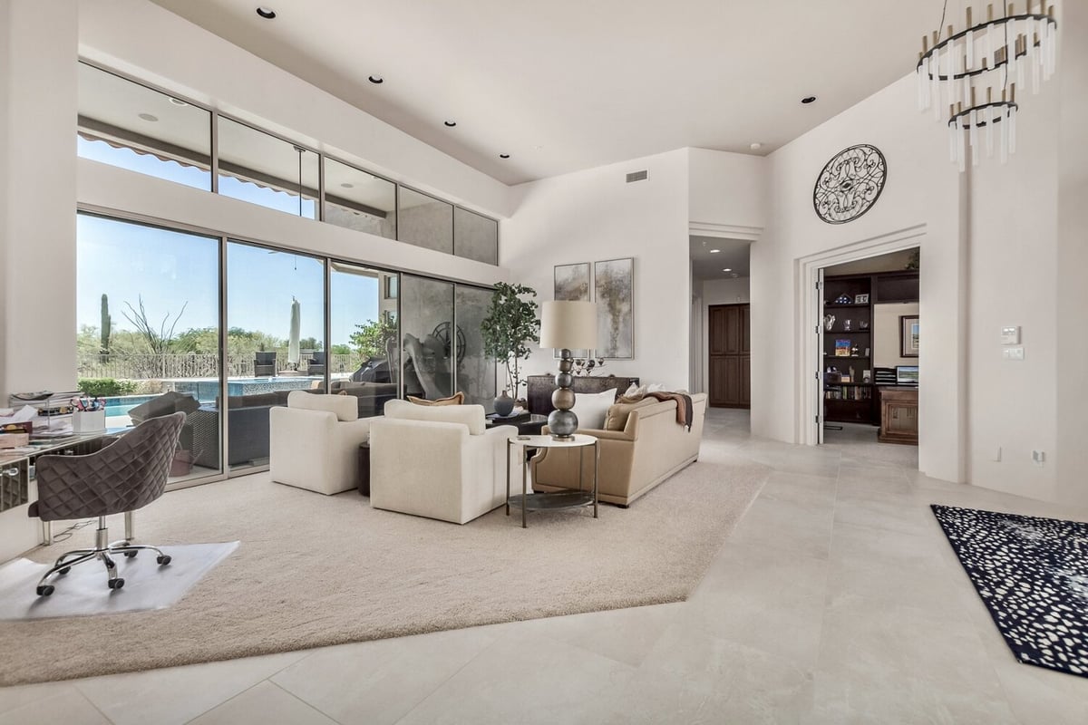 Luxury great room with floor-to-ceiling windows and outdoor access by Kitchens by Good Guys in Paradise Valley, AZ.