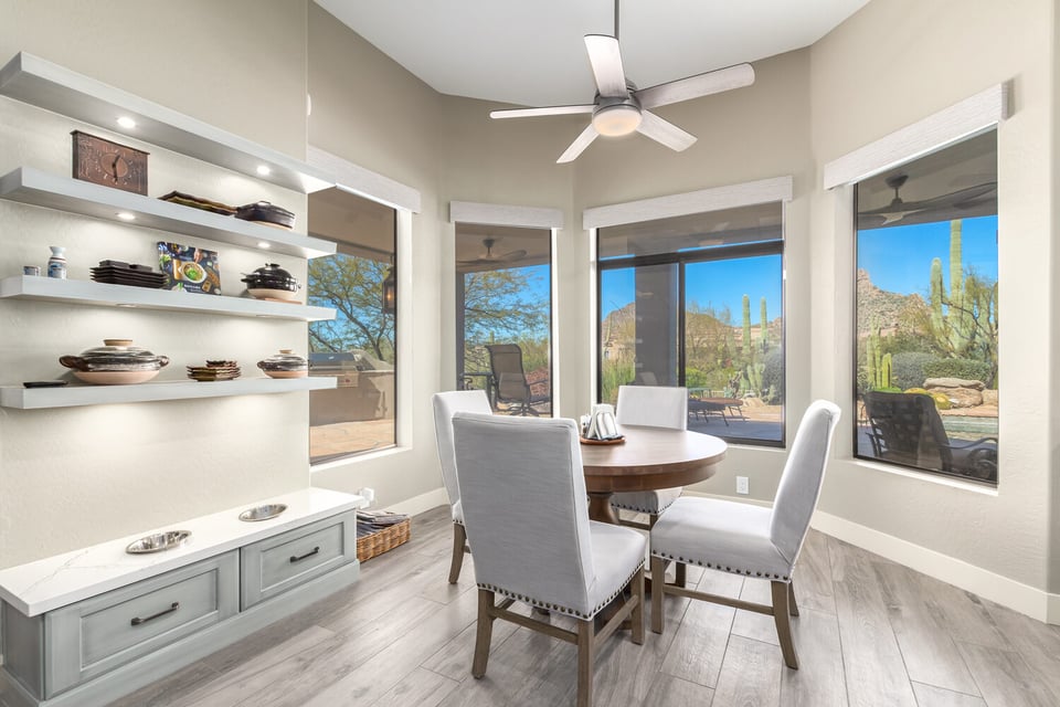 Bright custom home breakfast nook with mountain views by Kitchens by Good Guys in Scottsdale, AZ.