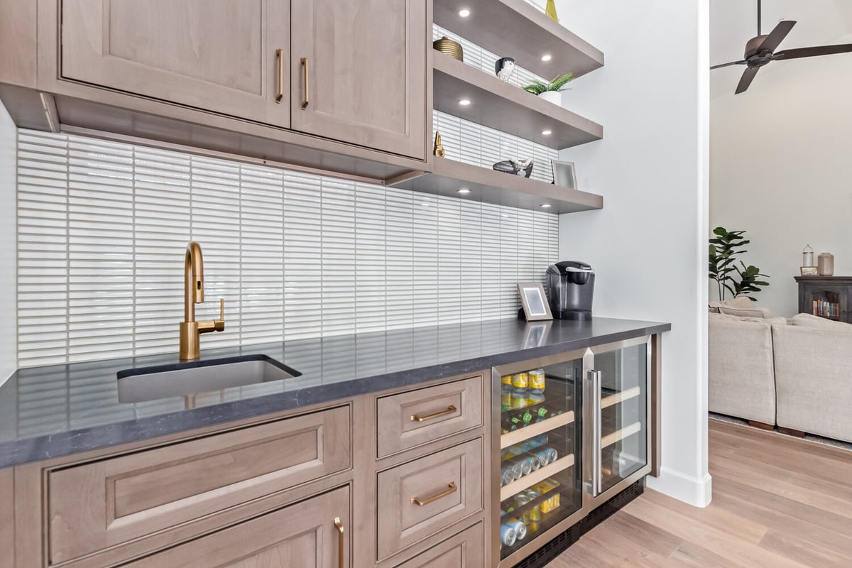 Built-in beverage center with under-counter coolers in Scottsdale custom home by Kitchens by Good Guys.
