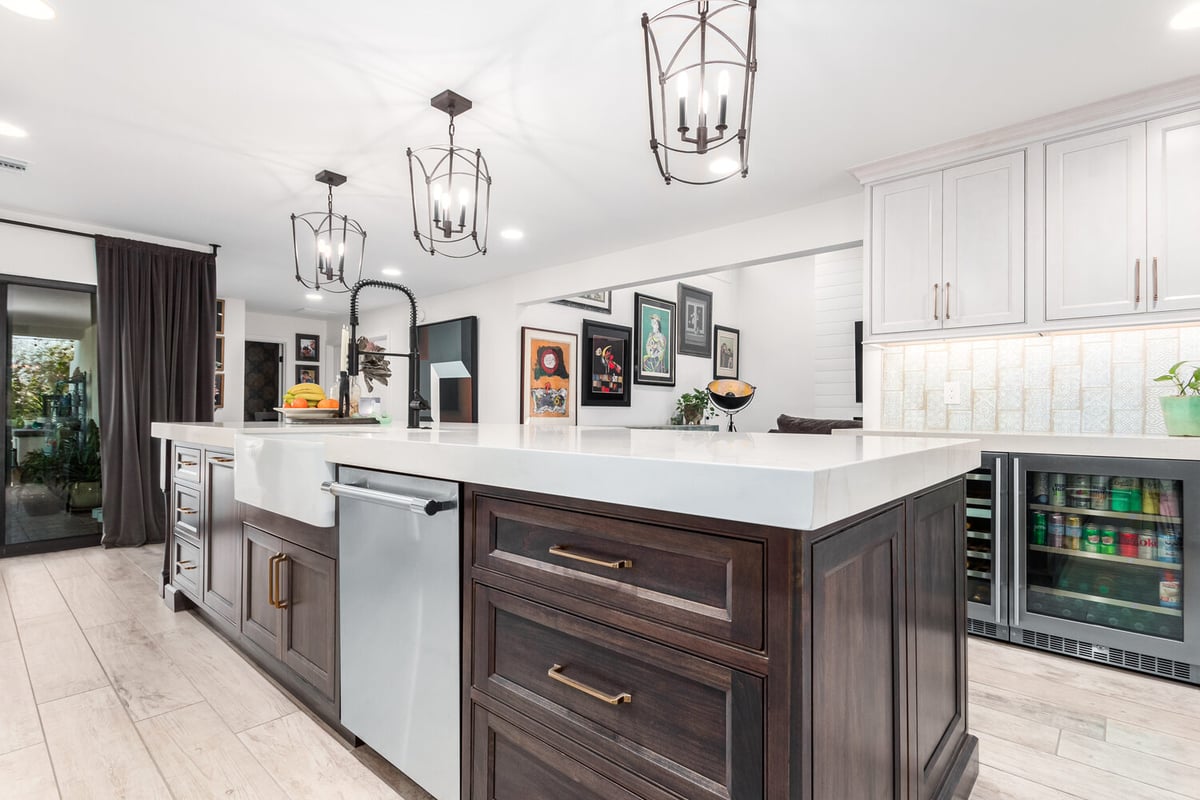 Detailed view of kitchen island with storage and integrated dishwasher in Paradise Valley by Kitchens by Good Guys.