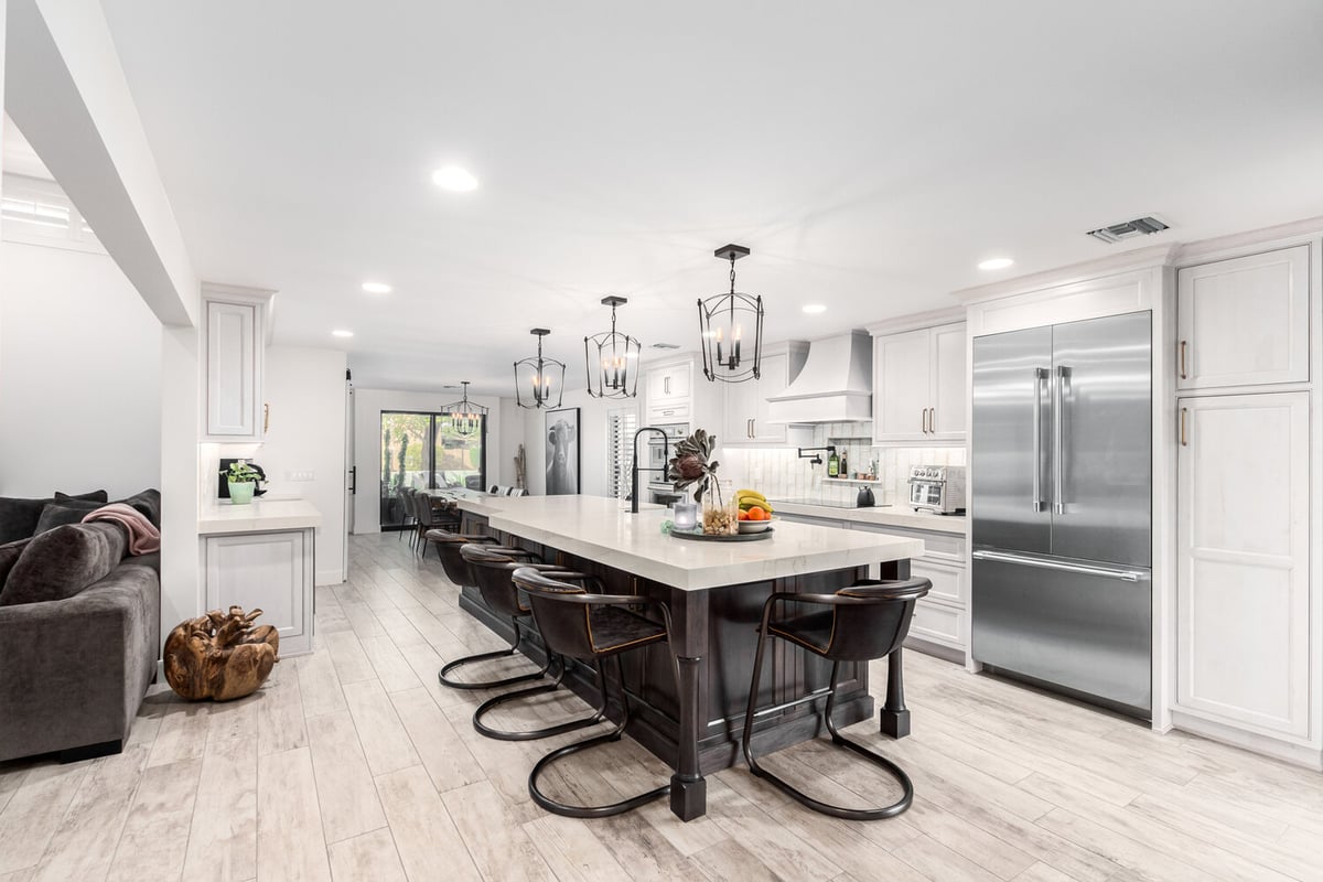 Open-concept kitchen and living space in Mesa custom home by Kitchens by Good Guys.