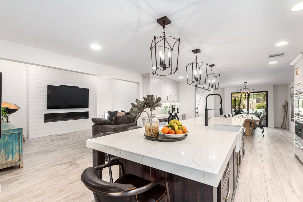 Spacious custom kitchen with large island and pendant lighting in Scottsdale, AZ by Kitchens by Good Guys.