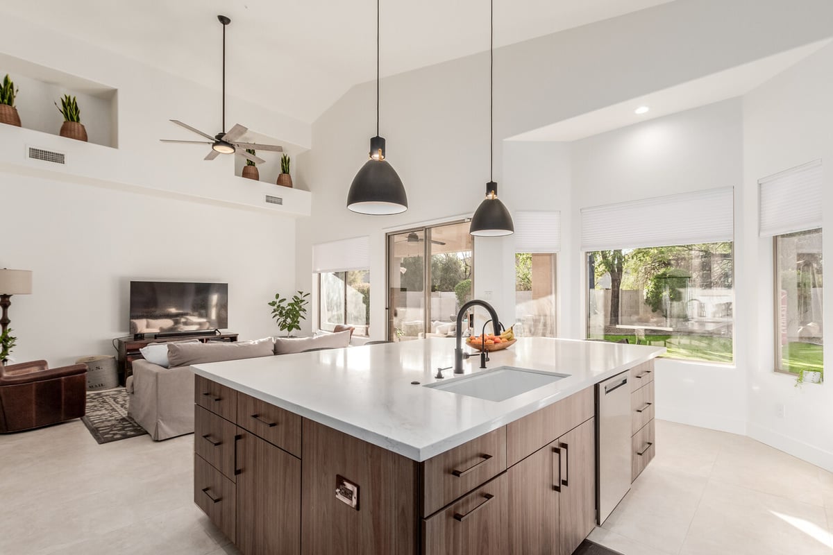 Custom kitchen with large island and seating in bright Scottsdale, AZ home by Kitchens by Good Guys.