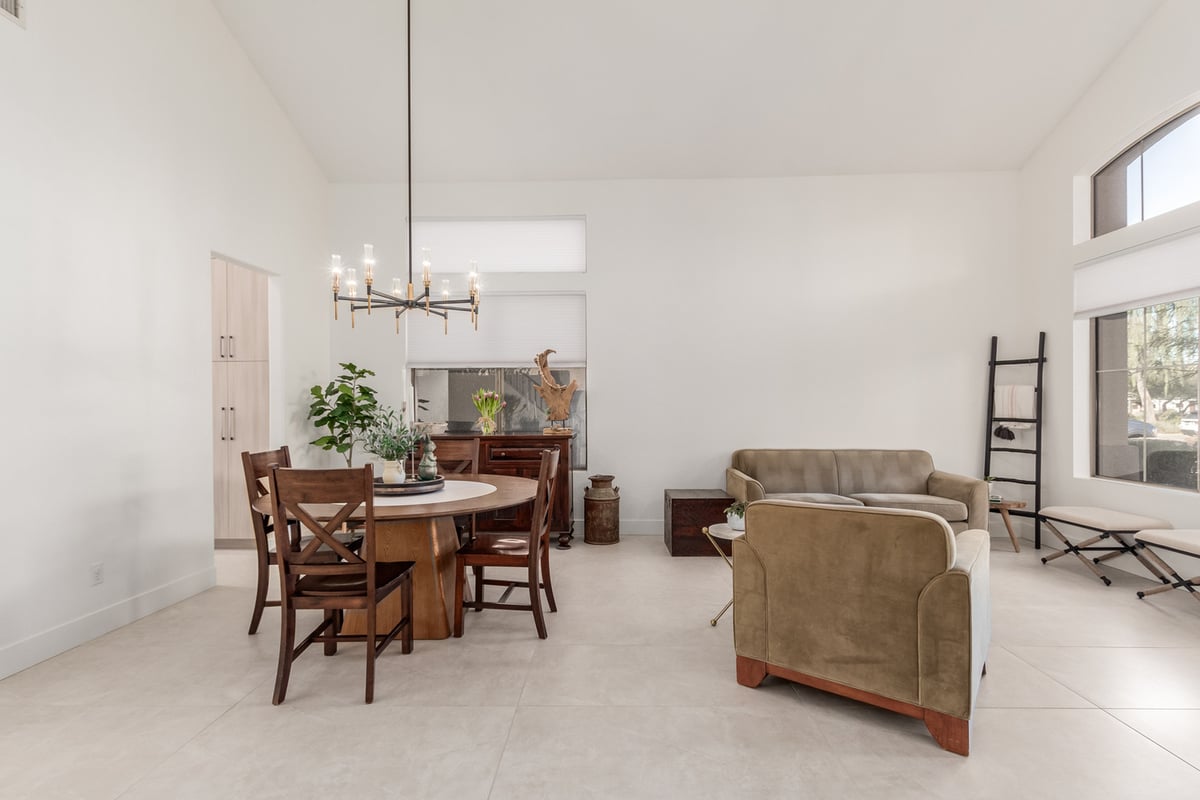 Dining and living room combination in Phoenix, AZ custom home by Kitchens by Good Guys.