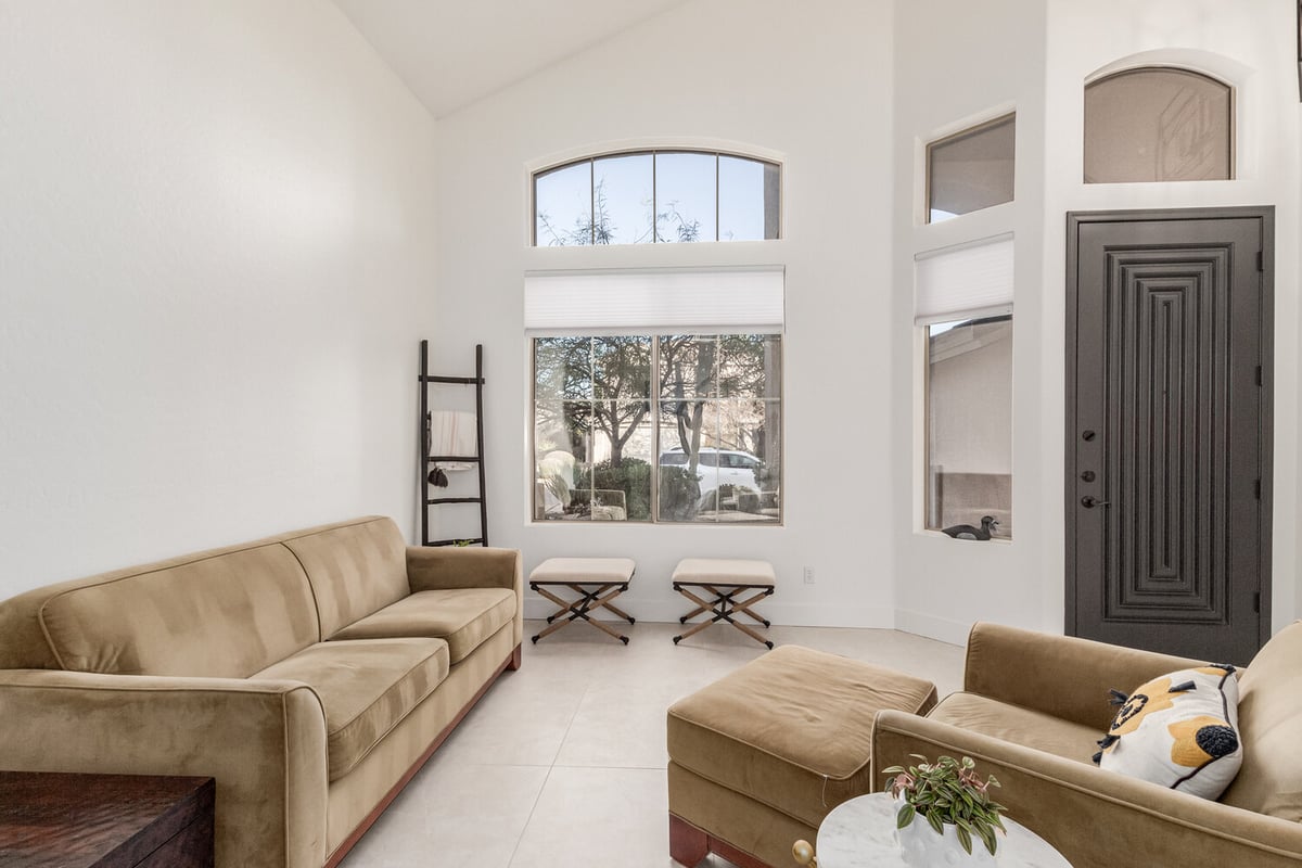 Entryway design featuring tall ceilings and clean lines in Paradise Valley custom home by Kitchens by Good Guys.