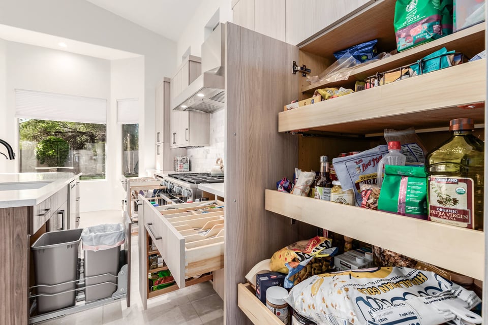 Pantry storage and cabinet organization in contemporary Paradise Valley home by Kitchens by Good Guys.