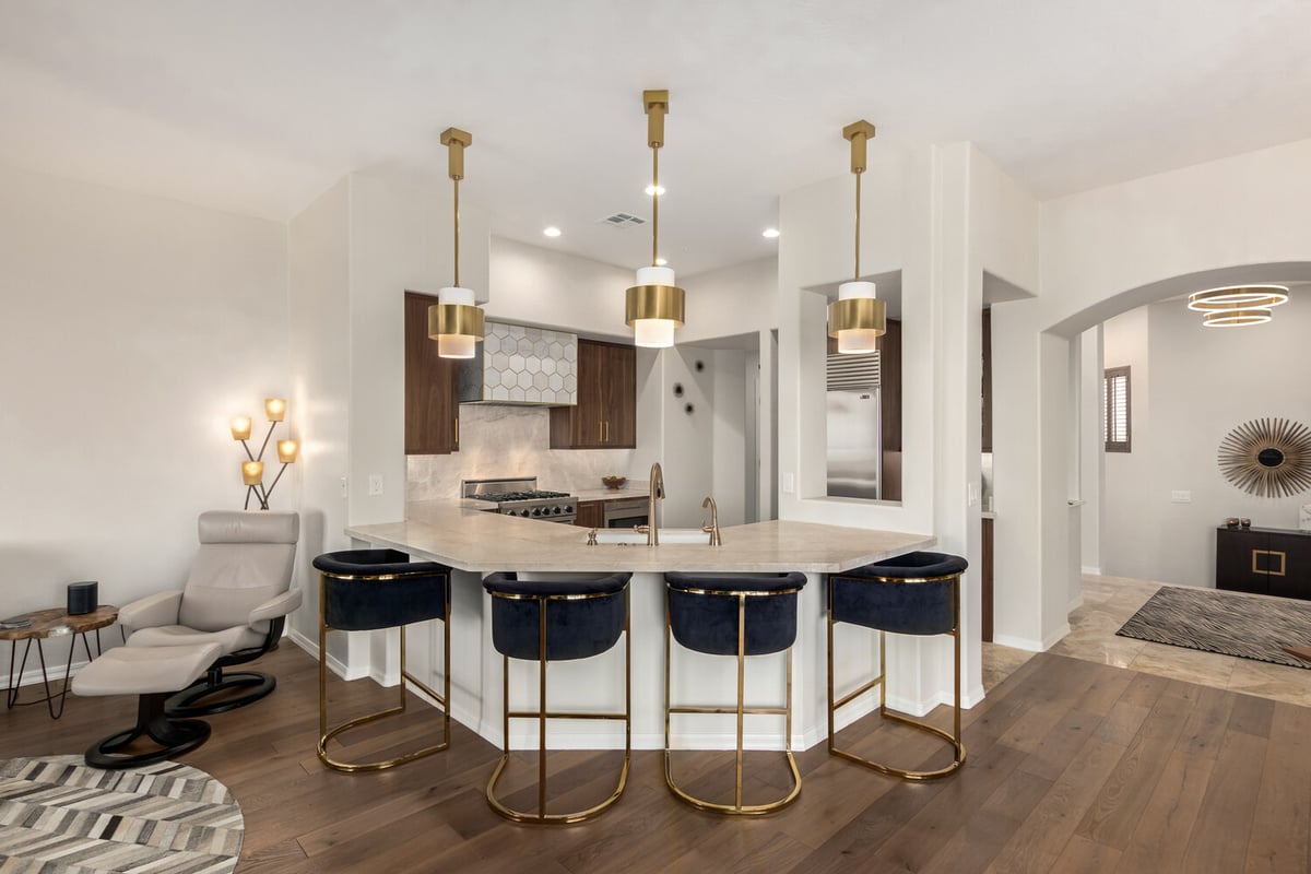 Arizona custom kitchen with white countertops and rich wood cabinets by Kitchens by Good Guys.