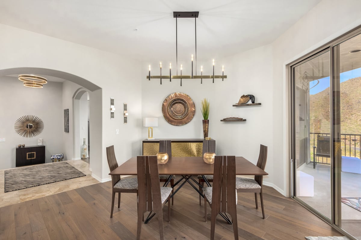 Stylish dining area with wood accents in a Paradise Valley custom home by Kitchens by Good Guys.