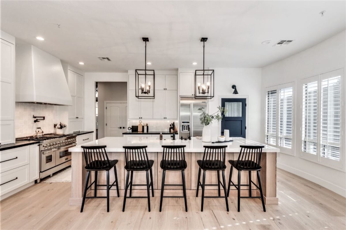 Classic white and wood kitchen design by Kitchens by Good Guys in Scottsdale, Arizona