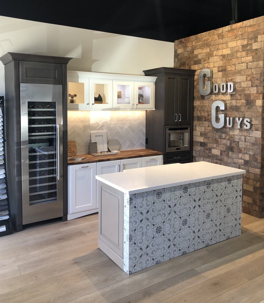 Kitchens by Good Guys showroom display featuring a mix of cabinetry styles and tile textures in Scottsdale, AZ