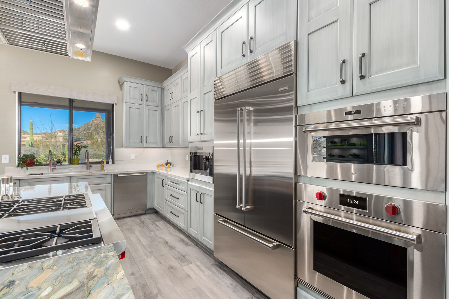 Premium kitchen appliance wall with built-in microwave and oven in Paradise Valley, AZ home by Kitchens by Good Guys. Premium kitchen appliance wall with built-in microwave and oven in Paradise Valley, AZ home by Kitchens by Good Guys.