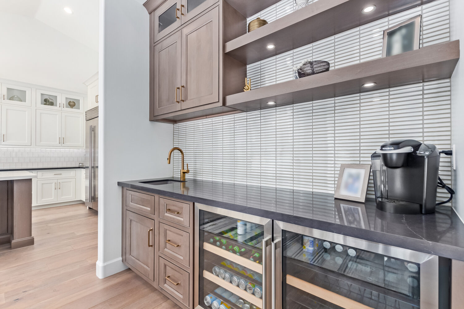 Close-up of custom bar cabinetry with decorative backsplash in Scottsdale, AZ by Kitchens by Good Guys.