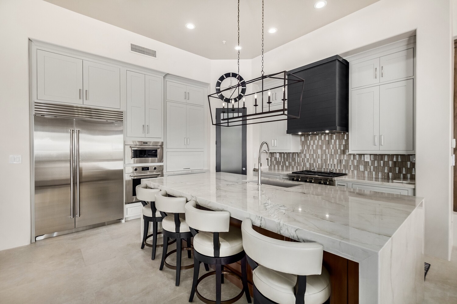 Custom home kitchen in Mesa featuring soft wood finishes by Kitchens by Good Guys