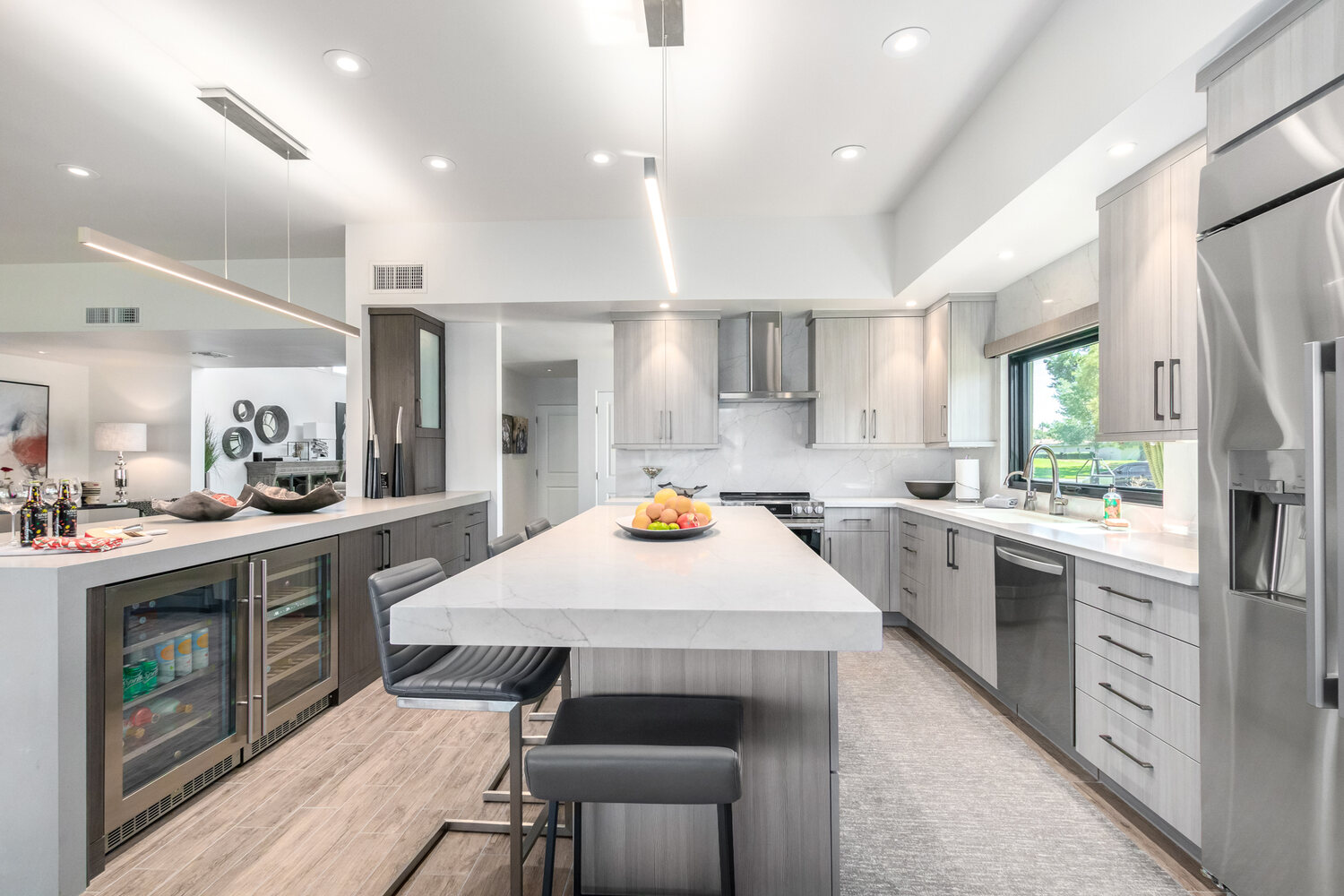 Gray-tone kitchen with seating for four by Kitchens by Good Guys in Paradise Valley, Arizona