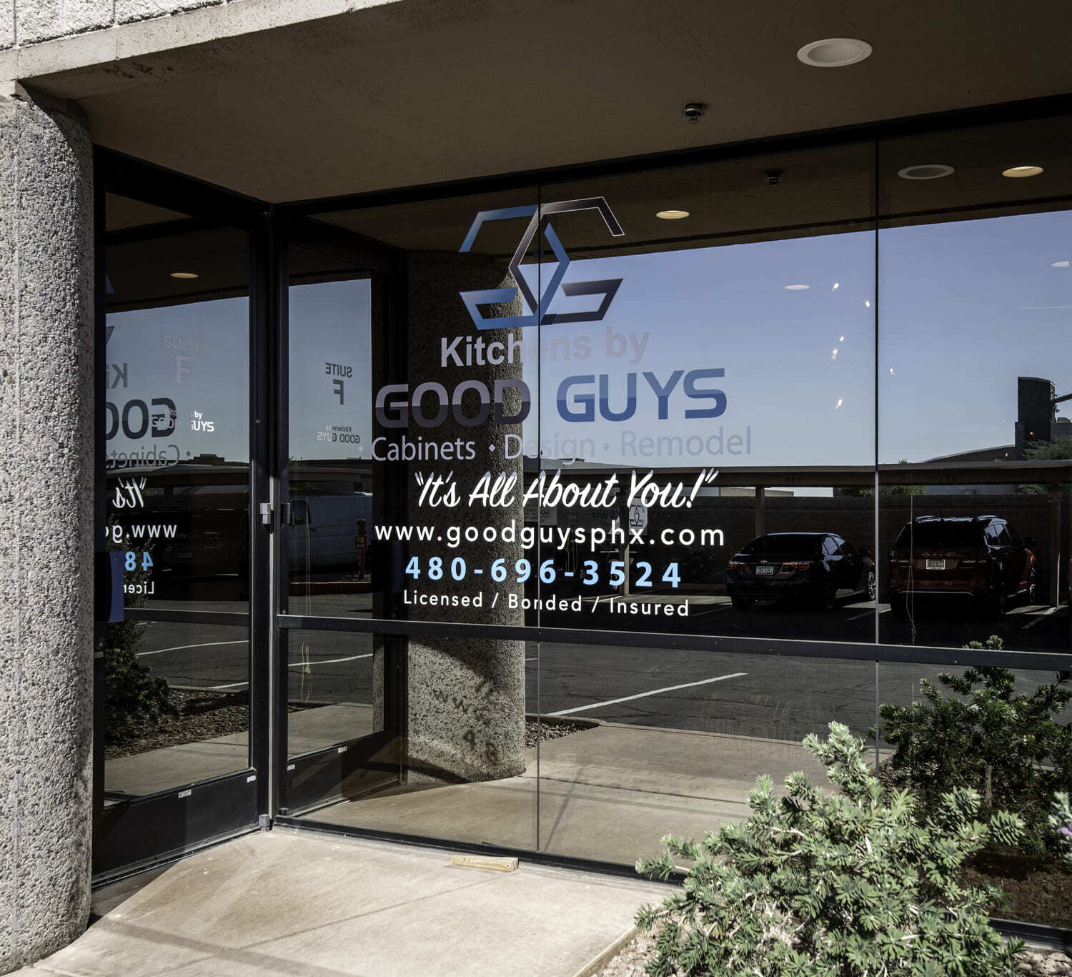 Kitchens by Good Guys logo and business details on glass windows and door for their showroom.